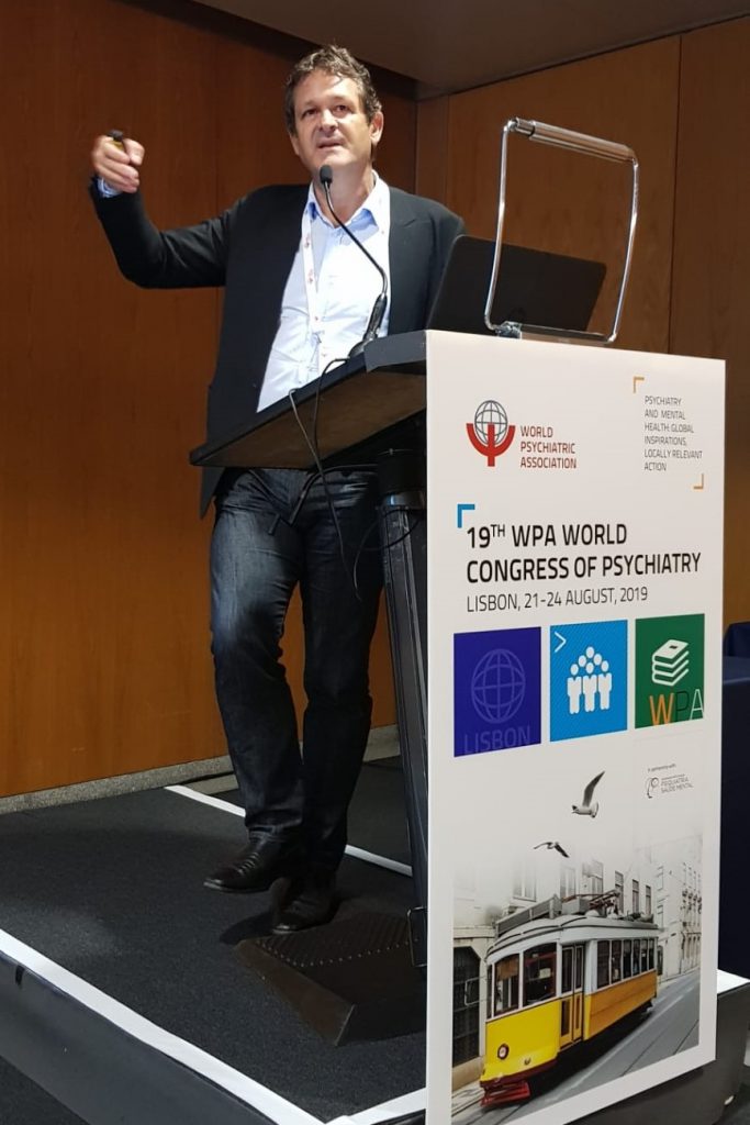 Dr. Paul Koeck, MD speaking at the19th World Congress of Psychiatry 2019, Lisbon about his reasearch