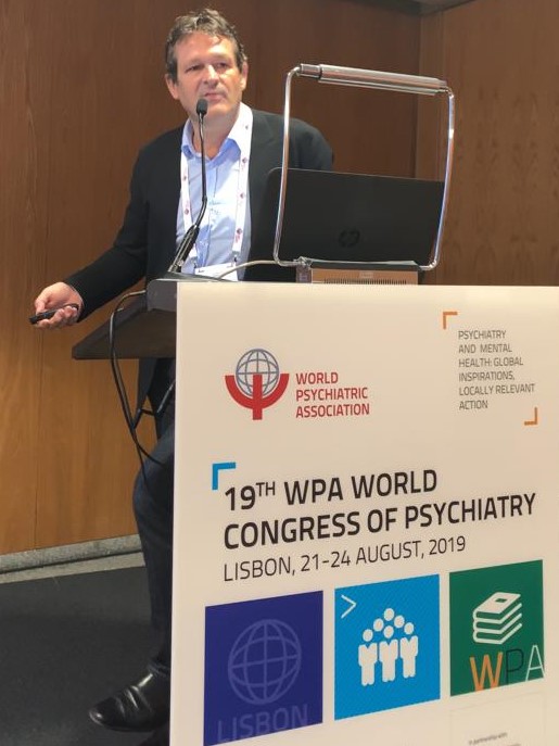 Dr. Paul Koeck, MD speaking at the19th World Congress of Psychiatry 2019, Lisbon about his reasearch